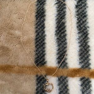 NWOT heart necklace with diamonds inside